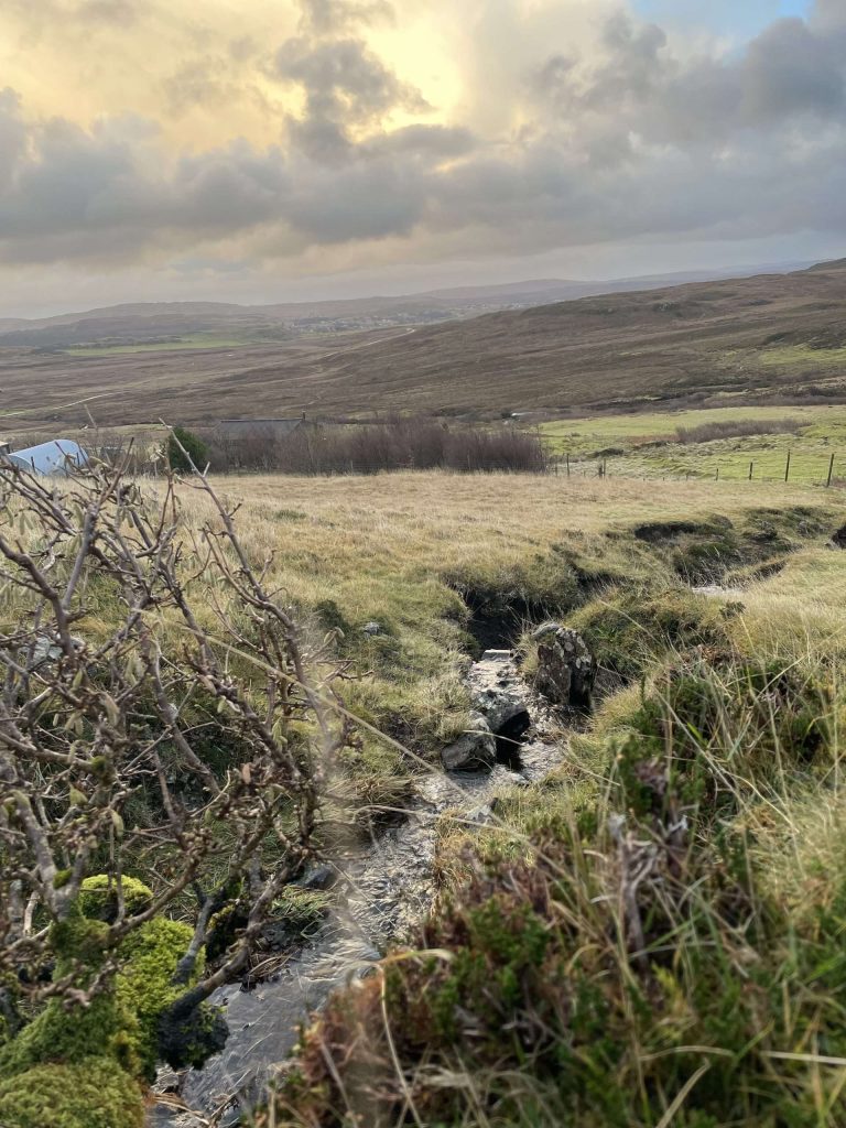 A portrait photograph of the burn which runs through and by the croft. 